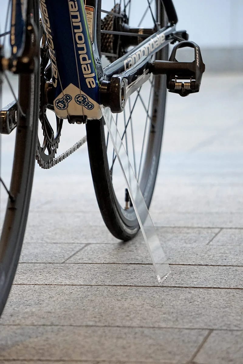 ShadowStand - Clear Acrylic Bike Stand for Photography — manufacturer reference image, not the actual item