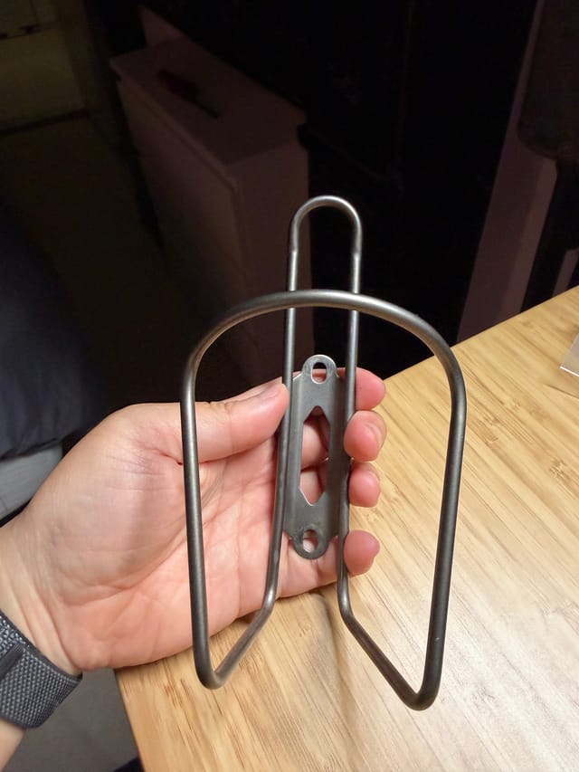 Silver aluminum water bottle cage